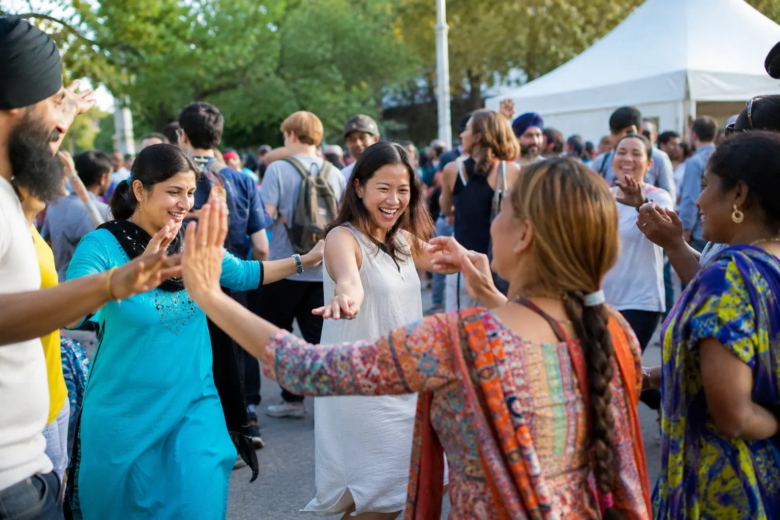 Residents from different cultural communities participating together in one shared civic event.